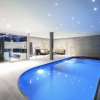 Luxueuse nouvelle construction à vendre à Sant Antoni de Calonge, Costa Brava, presque prête à emménager avec 6 chambres, 8 salles de bains et 2 piscines